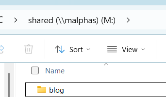 File Explorer showing mapped drive shared (\malphas) (M:) with blog folder visible